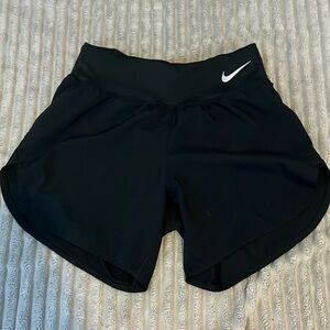 Long black Nike running shorts